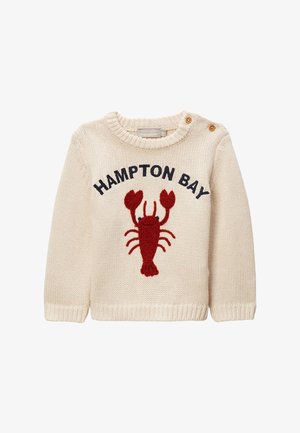 Pull bébé tricoté crème avec motif homard rouge, texte "HAMPTON BAY" et deux boutons marron près de l'encolure sur l'épaule gauche.