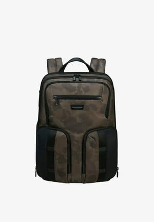 Dark camouflage backpack with padded straps, multiple zippered pockets, textured fabric, and contrasting black accents.