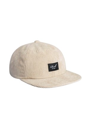 Beige corduroy baseball cap with black rectangular logo patch reading "Reell est. 1997" on front panel.