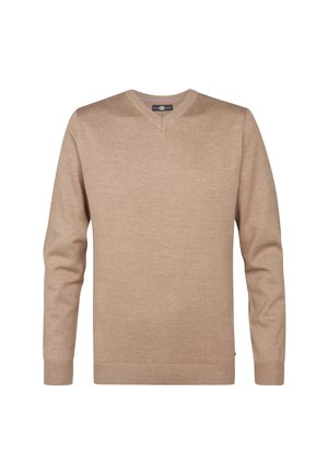 Beige neulepulli, jossa on V-pääntie, pitkät hihat sekä ribbireunat hihansuissa ja helmassa. Tasainen pinta, yksinkertainen muotoilu, eikä näkyviä kuvioita tai yksityiskohtia.