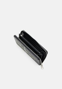Calvin Klein Jeans SCULPTED ZIP AROUND MONO - Portafoglio - fashion black