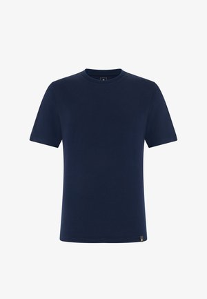T-shirt bleu marine à manches courtes et col rond avec une petite étiquette noire en bas de l'ourlet.