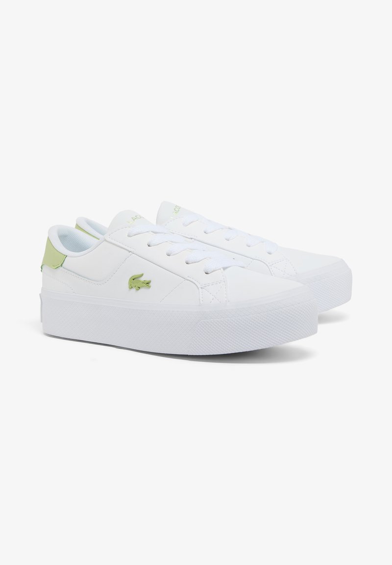 Pair of white low-top sneakers with green accents, laces, and platform soles on a plain white background.