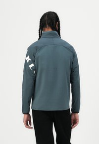Oakley ENHANCE TECH JACKET - Summer jacket - dark slate