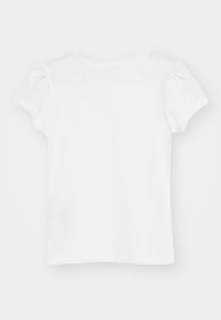 Weißes T-Shirt mit kurzen Ärmeln, runden Halsausschnitt und leicht gepufften Ärmeln. Aus weichem Stoff gefertigt, besticht es durch ein einfaches, schmuckloses Design.