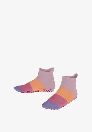 Chaussettes basses colorées avec des points en caoutchouc antidérapants. Fabriquées en matériau doux, avec des nuances de lavande, de pêche et de mauve dans un motif rayé.