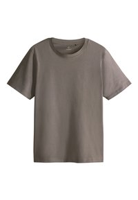 T-shirt kaki manches courtes col rond avec un ourlet droit, présenté sur un fond blanc.