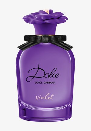 Flacon de parfum violet Dolce & Gabbana avec un nœud noir et un bouchon violet en forme de fleur, étiqueté "Dolce violet."