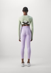 Nike Performance UNIVERSA 7/8 - Leggingek - lilac bloom