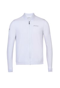 Hvid sportsjakke med fuld lynlås, lange ærmer og Babolat-logo på brystet og venstre arm, letvægts- og tætsiddende design.