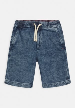 Dunkelblaue Jeansshorts mit einem Kordelzugbund. Verfügt über zwei Seitentaschen und ein kleines Logodetail am unteren Saum.