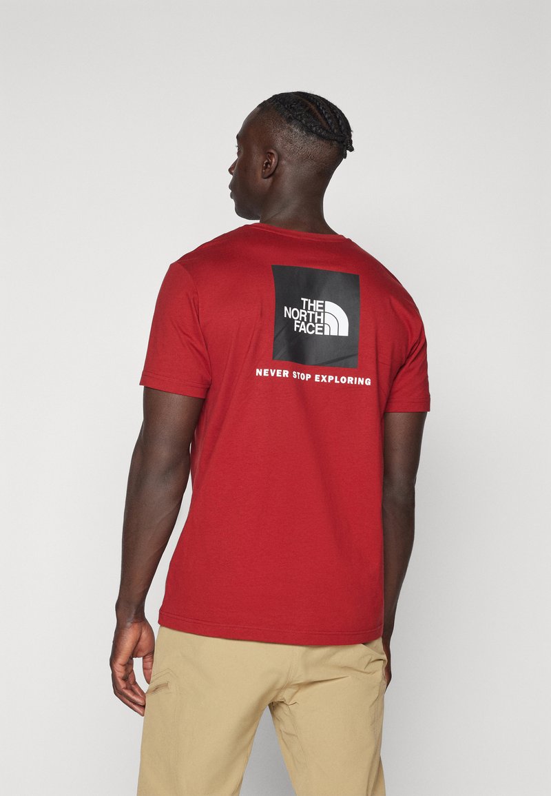 The North Face M SS BOX NSE TEE - T-shirts print - iron red