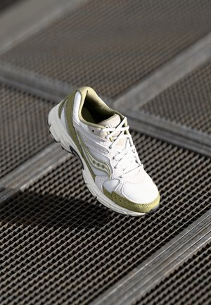 White and olive green running shoe with textured mesh upper, padded collar, and rubber sole. Lace-up design with reinforced accents.