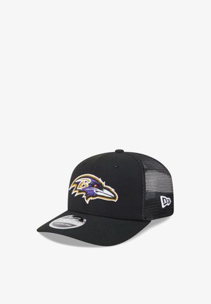 Black mesh-back cap with Baltimore Ravens logo on front and New Era logo on side, featuring a curved brim and adjustable snap closure.