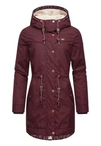 Burgundy waterproof jacket with a fur-lined hood, drawstring waist, snap buttons, and two side pockets. Features a patterned lining.