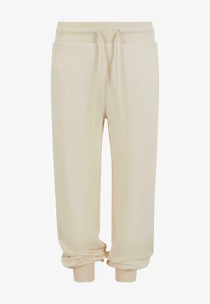 Beige sweatpants met een knoopsluiting in de taille, ribgebreide manchetten en een zachte textuur. Het ontwerp heeft een relaxte pasvorm voor extra comfort.