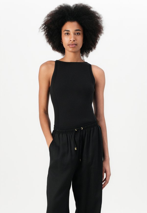 CLARA TROUSERS - Trousers3