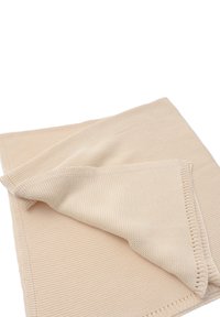 Beige gestrickte Decke mit einem strukturierten Muster, ausgestattet mit einem gesäumten Rand und weichem, gewebtem Stoff. Faltet sich sanft über sich selbst.