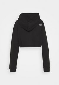 Sweat à capuche cropped noir à manches longues, avec petit logo blanc The North Face en haut à droite dans le dos.