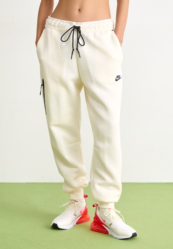 TCH  JGGER - Tracksuit bottoms - pale ivory
