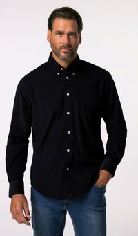 Camicia di velluto a coste blu navy con maniche lunghe, colletto button-down, tasca frontale e botttoni bianchi, abbinata a jeans blu.