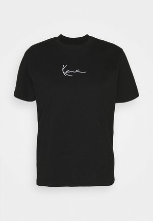 Black cotton t-shirt with short sleeves, featuring a white signature graphic on the chest and a classic crew neck design.