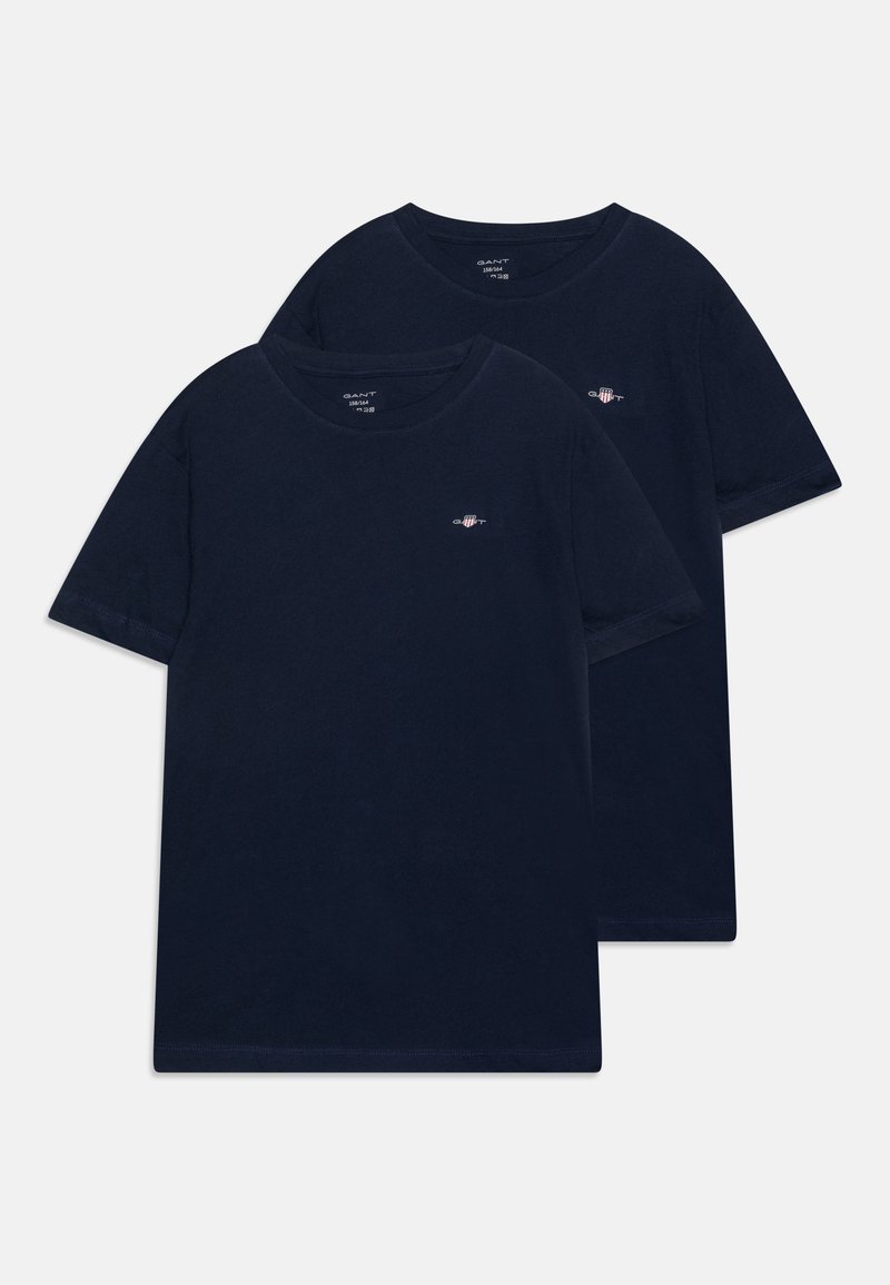 T-shirt in cotone blu navy, maniche corte, collo rotondo, con un piccolo logo sul lato sinistro del petto. Progettata per comfort e durata.