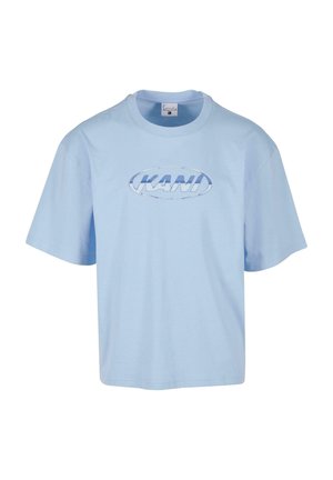 T-shirt in cotone azzurro chiaro con vestibilità rilassata, maniche corte e un logo grafico frontale all'interno di una forma ovale. Tessuto liscio.