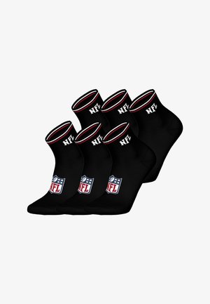 Black ankle socks featuring ribbed cuffs, NFL logo in white and red, and five-pack set arrangement. Cotton blend material, smooth texture.