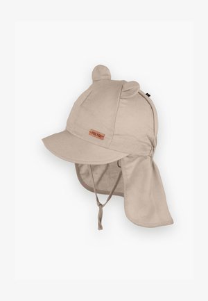 Gorra de algodón beige con orejas de oso, ala ancha y solapas para el cuello. Presenta una pequeña etiqueta de cuero marrón en la parte delantera para un detalle adicional.