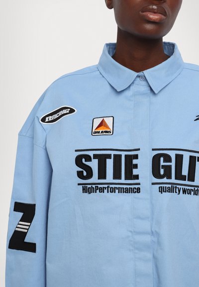 Stieglitz REZA - Gombos blúz - blue