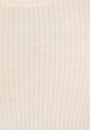 Tessuto a coste di colore crema, con una morbida texture e linee sottili che scorrono verticalmente. Nessun motivo o ornamento visibile.