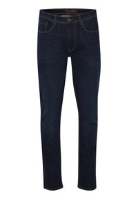 Jeans de mezclilla azul oscuro con corte slim, que cuentan con cinco bolsillos y costuras amarillas en contraste. Textura suave, diseño clásico.