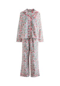 Floral pajama set featuring a pink background with green leaves and red flowers, made of lightweight fabric. Includes button-up top and pants.