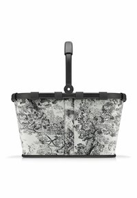 Panier à motifs noir et blanc avec une poignée robuste, fabriqué en tissu et en plastique, présentant un design floral et une forme rectangulaire.