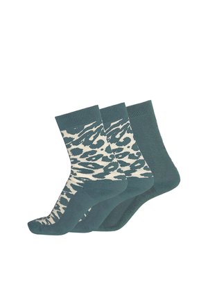 Three teal ankle socks, two with white and teal abstract leopard print, one solid teal, arranged side by side on white background.