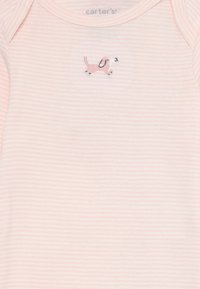 Light pink striped onesie with short sleeves, featuring an embroidered pink dog design on the chest. Soft cotton material.