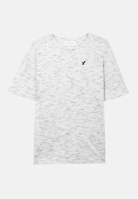 Λευκό και γκρι πουά κοντομάνικο μπλουζάκι με στρογγυλή λαιμόκοψη και μικρό μαύρο λογότυπο πουλιού στο αριστερό στήθος.