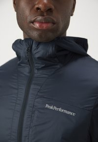 Peak Performance RADIANCE HYBRID HOOD - Outdoorjakke - black