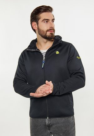Zwarte op-rits jas met een capuchon, voorzien van een groen logo op de borst, elastische manchetten en een textuurstof met een gladde afwerking.