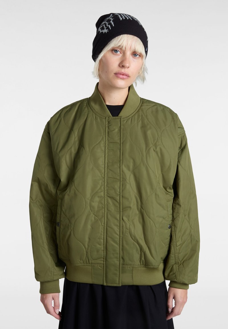 Olive green quilted bomber jacket with ribbed collar and cuffs, featuring subtle stitching patterns and snap button closures.