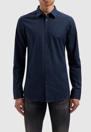 Navy blue long-sleeve shirt with a button-down collar, smooth fabric, and a tailored fit. Features a front button closure and subtle sheen.