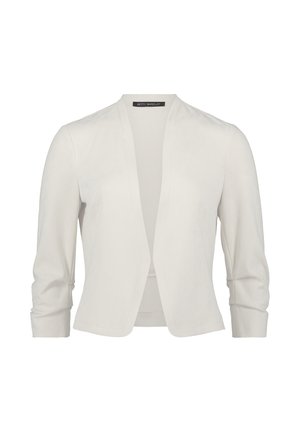 Giacca bianca leggera con design aperto e maniche a tre quarti, caratterizzata da una texture morbida e dettagli di cucitura minimi.