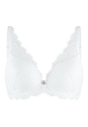 Witte kanten beha met een diepe V-vorm, een gestructureerd bloemenpatroon, gegolfde randen en een centrale decoratieve hardware detail. Verstelbare bandjes.