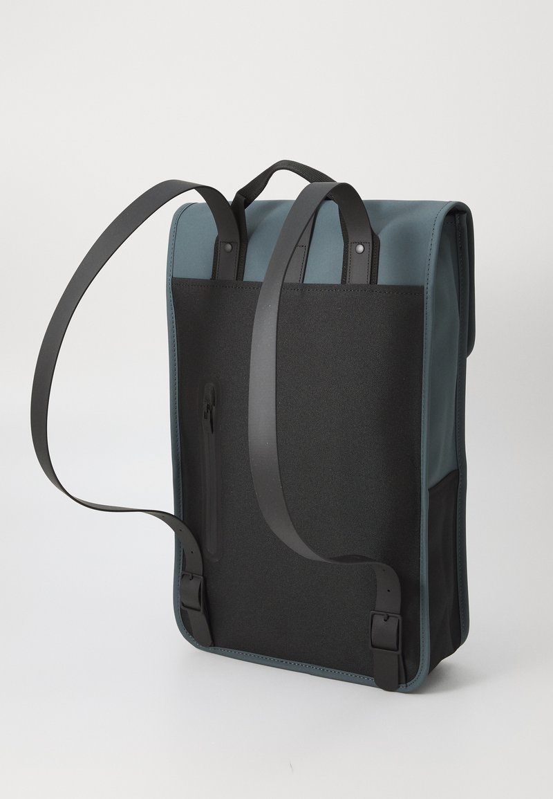 rains uk backpack polyurethane, polyester blue dusk Book Daypack is a waterproof bag offering a minimal silhouette in campus Rains BACKPACK UNISEX - Rucksack