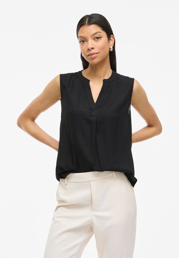 ELEGANTE ÄRMELLOSE MIT V-AUSS - Top - schwarz