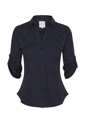 Navy blue button-up shirt with a tailored fit, featuring two front pockets, roll-up sleeves, and black buttons on a smooth fabric.