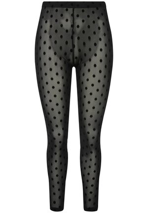 Leggings neri con pois realizzati in materiale trasparente, dotati di una vita elasticizzata e di un design aderente e affusolato. I pois sono distribuiti in modo uniforme.