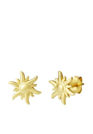 Boucles d'oreilles en métal doré en forme de tournesols avec des centres arrondis et des rayons en forme de pétales courbés, présentant une finition lisse et polie.