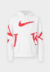 Bela kapuca majica iz bombaža, z velikimi rdečimi logotipi Nike in grafiko, sprednjim kengurujskim žepom in rebrastimi manšeti.